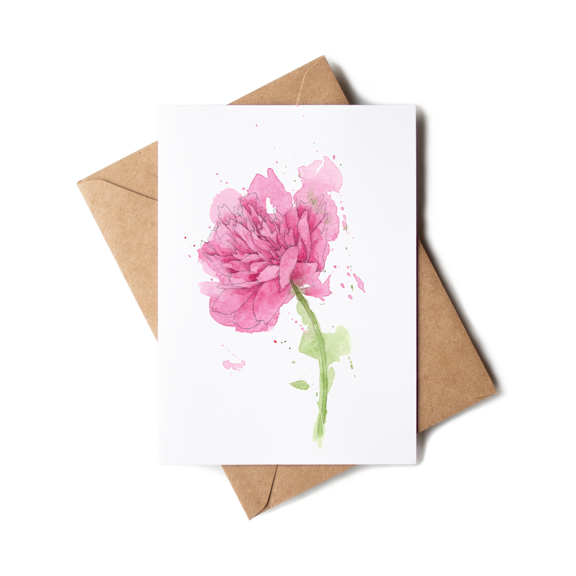 Greeting card with pink flower design and brown envelope on white background