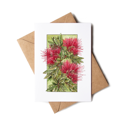 Greeting card with red flowers and green leaves on a white background with a brown envelope.