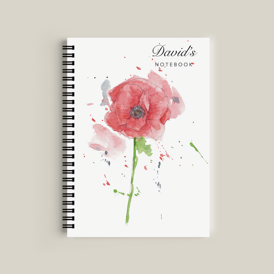 Notebook with a watercolor flower design on a beige background