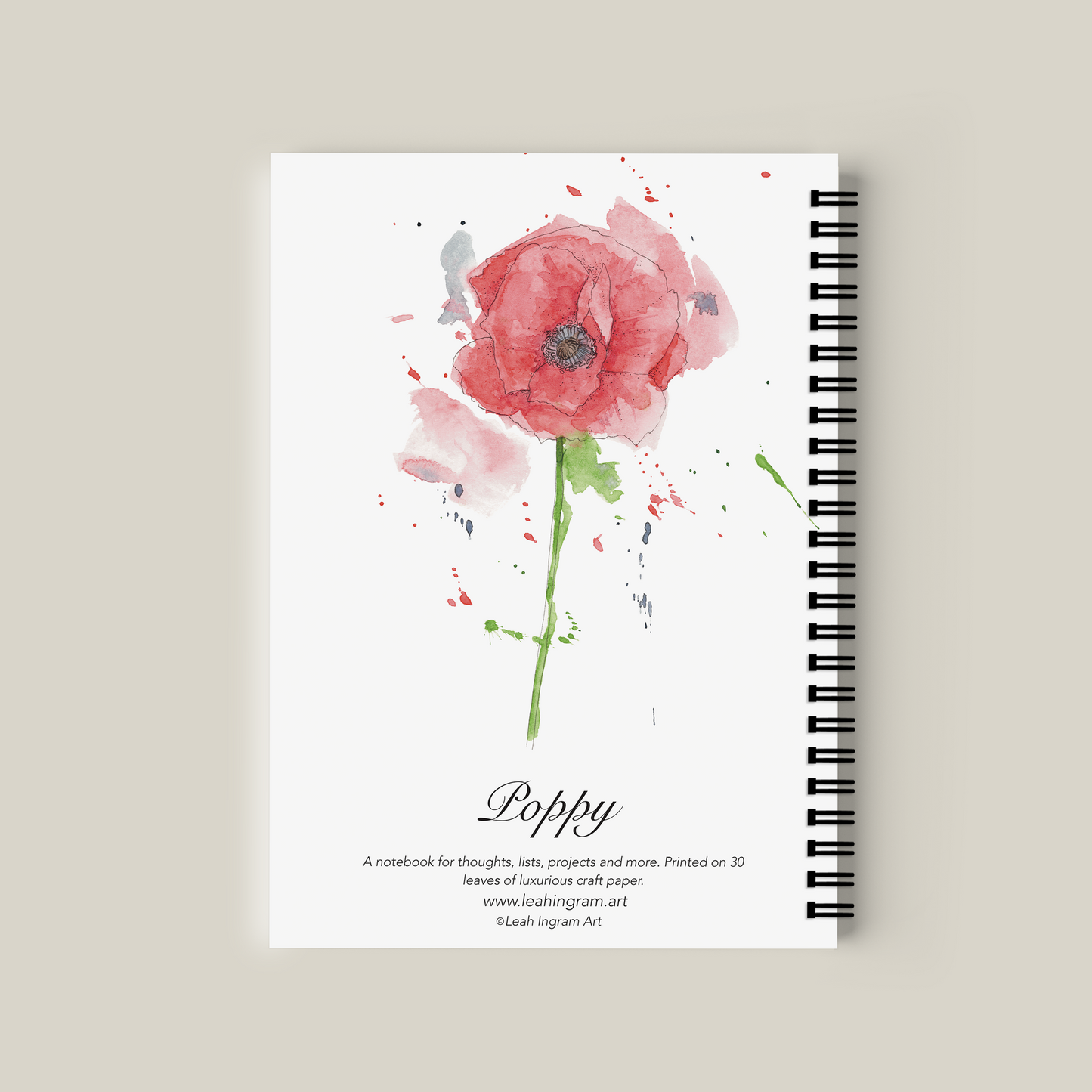 Notebook with a watercolor design of a pink poppy on a beige background