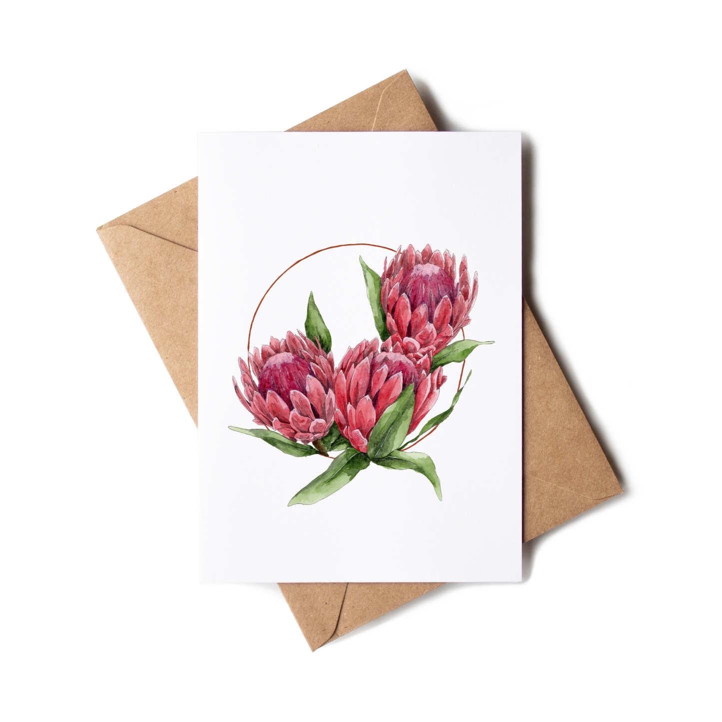 Greeting card with pink flowers and a brown envelope on a white background