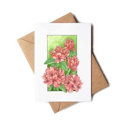 Greeting card with pink floral design on a white background with a brown envelope.