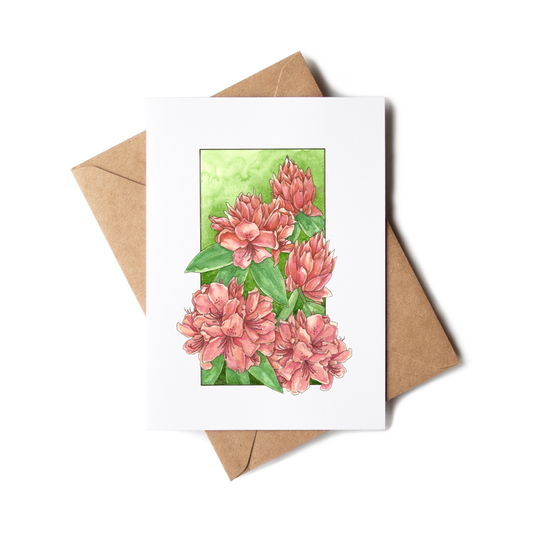 Greeting card with pink floral design on a white background with a brown envelope.