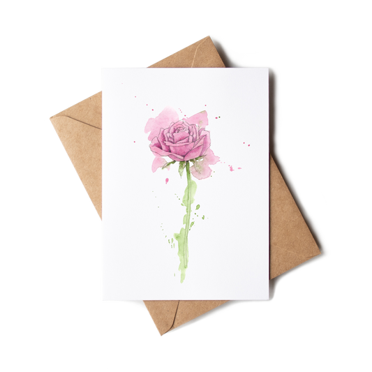 Greeting card with a pink rose design and a brown envelope on a white background