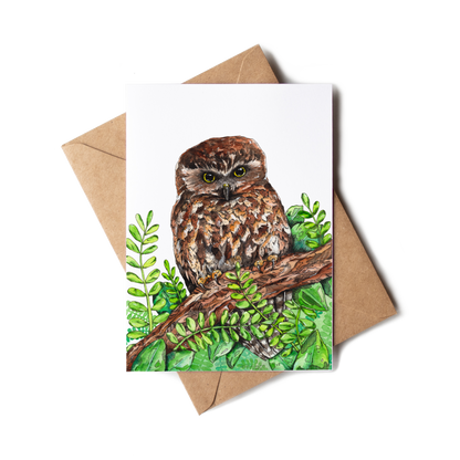 Greeting card with owl illustration on a branch and leaves, featuring a brown envelope.