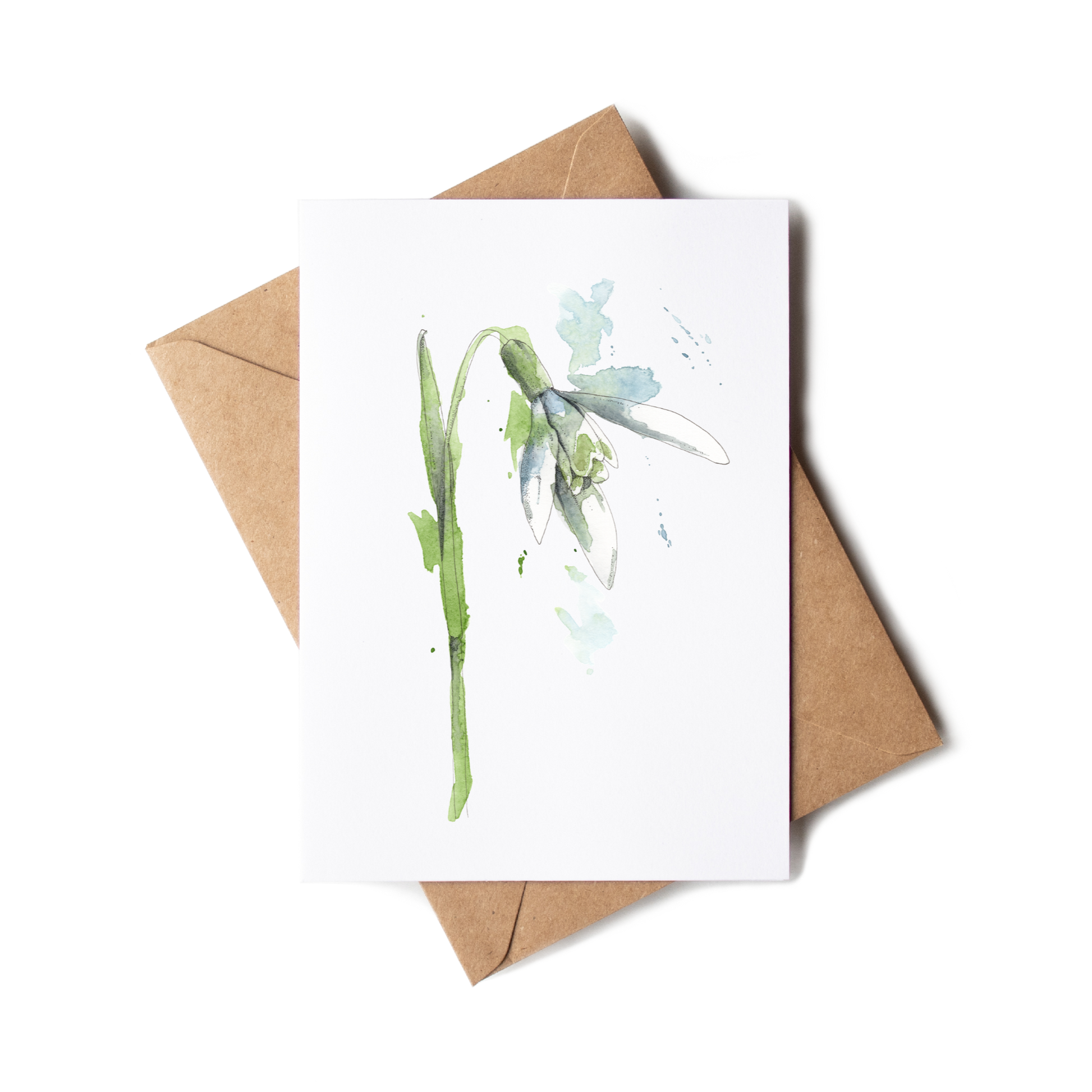 Greeting card with floral design and brown envelope on white background