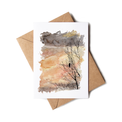 Greeting card with a tree silhouette and envelope on a white background