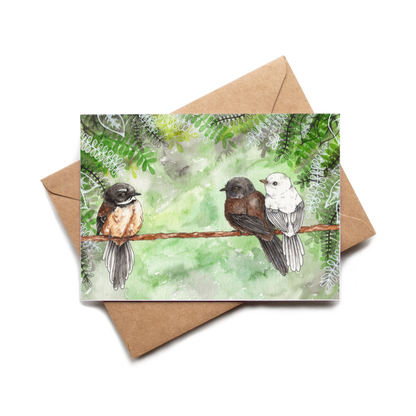 Card with two birds on a branch and a brown envelope on a white background