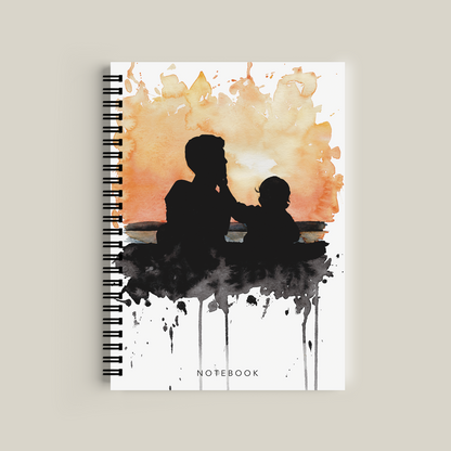 Notebook with a cover featuring a silhouette of a child and adult against an abstract watercolor background.