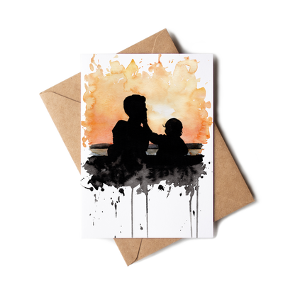 Greeting card with silhouette of a man and child against watercolor background, accompanied by a brown envelope.