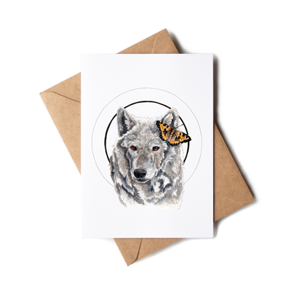 Greeting card with a wolf illustration on a white background with a brown envelope.