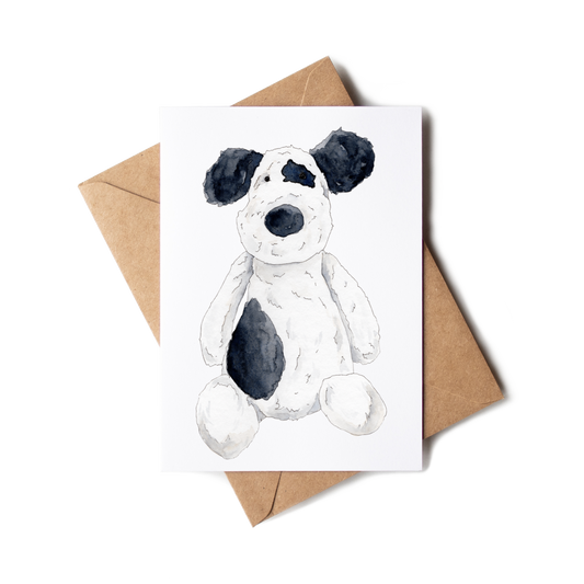 Greeting card with a black and white dog illustration on a white background