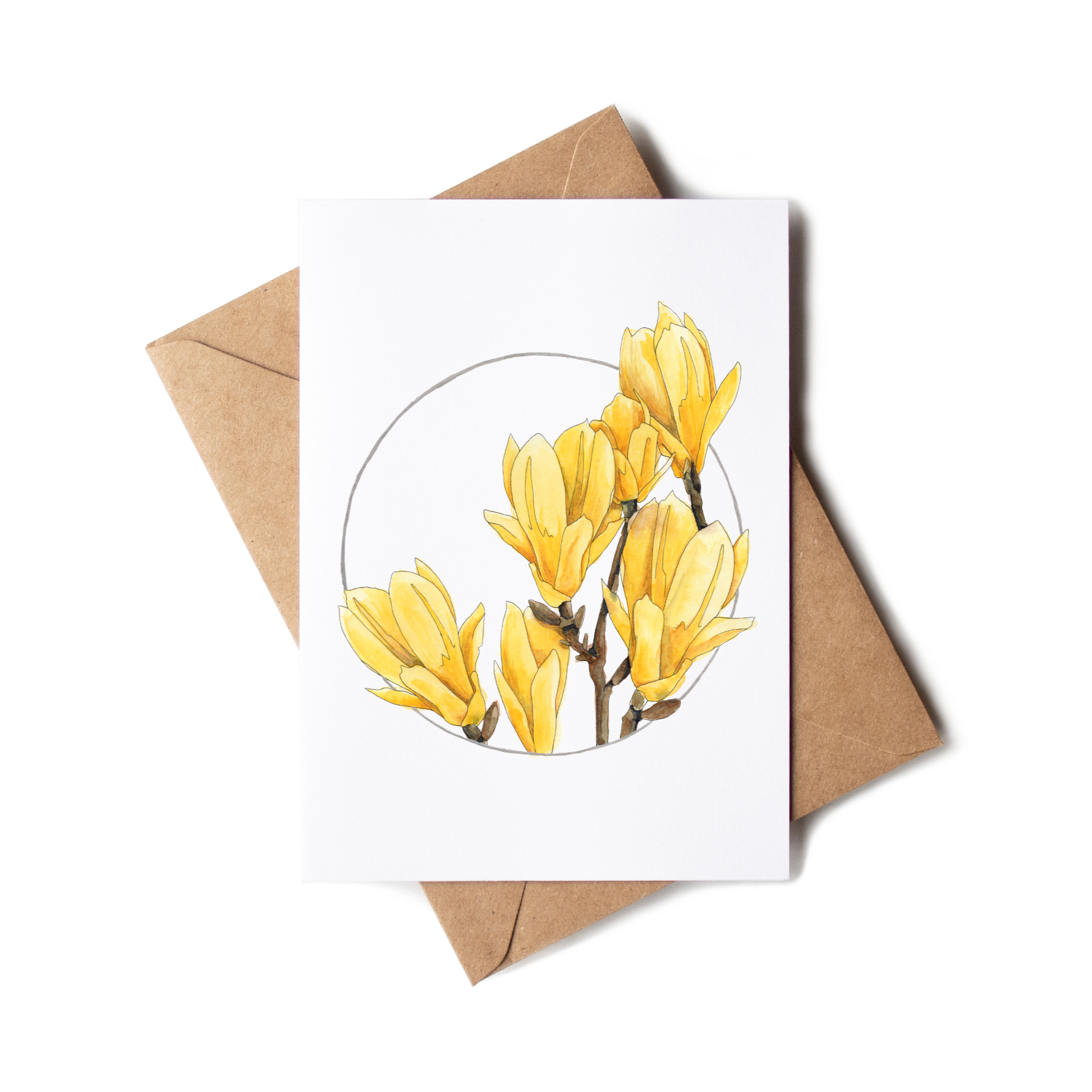 Greeting card with yellow floral design on a white background with a brown envelope.