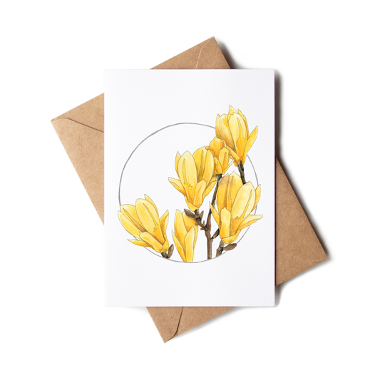 Greeting card with yellow floral design on a white background with a brown envelope.